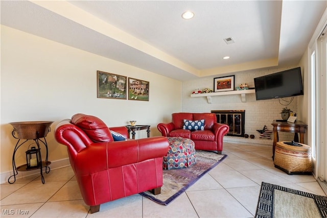 30 E Mohawk Dr, Malvern, OH 44644 - living area featuring light tile patterned floors, recessed lighting, a fireplace, and a tray ceiling