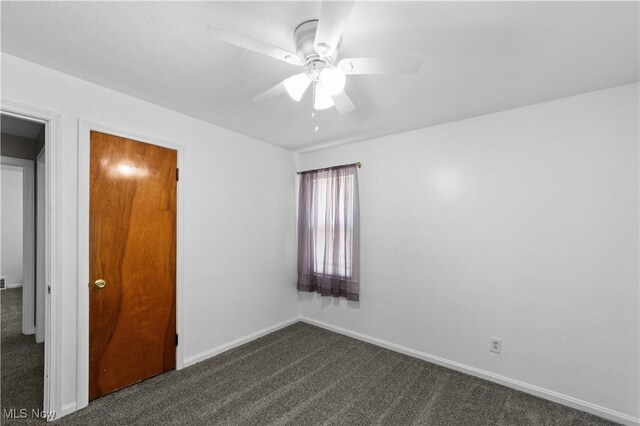 3937 W 227th St, Fairview Park, OH 44126 - spare room with dark colored carpet and ceiling fan