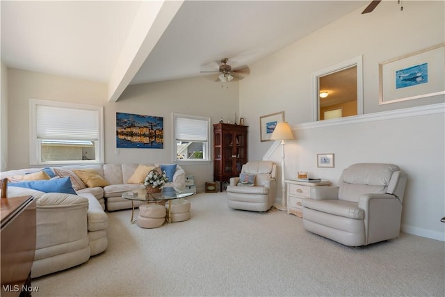 32 E Mohawk Dr, Malvern, OH 44644 - carpeted living area with ceiling fan and lofted ceiling