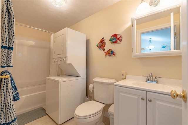 32 E Mohawk Dr, Malvern, OH 44644 - bathroom with stacked washer and clothes dryer, vanity, shower / tub combo, and tile patterned flooring