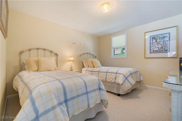 32 E Mohawk Dr, Malvern, OH 44644 - carpeted bedroom with baseboards