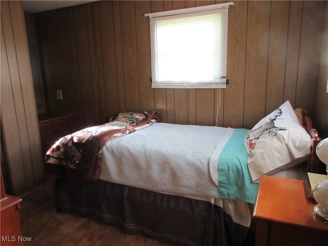 4455 Buck Run, Linesville, PA 16424 - bedroom featuring wood walls and carpet flooring