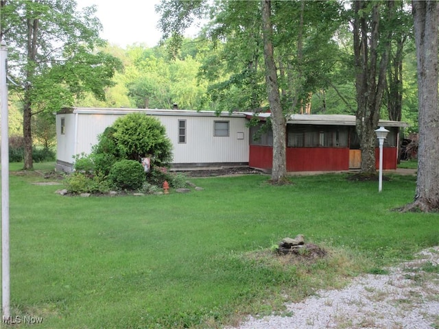 4455 Buck Run, Linesville, PA 16424 - back of property with a lawn