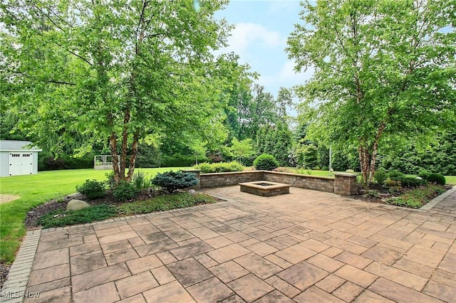 3179 Merion Ct, Westlake, OH 44145 - view of patio / terrace featuring a fire pit and an outdoor structure