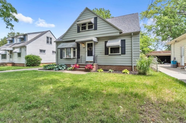 4465 W 156th St, Cleveland, OH 44135 - bungalow-style home with a front lawn and a shingled roof