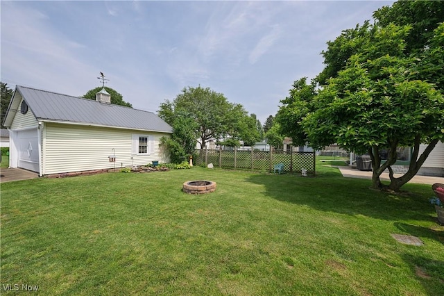 815 N Walnut St, Dover, OH 44622 - view of yard featuring a fire pit