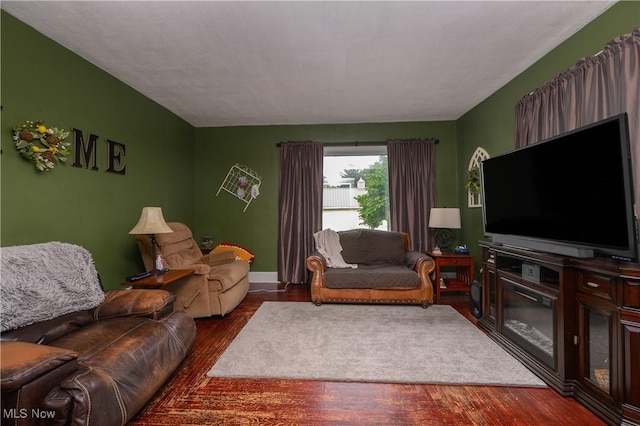 815 N Walnut St, Dover, OH 44622 - living area featuring dark wood-style flooring