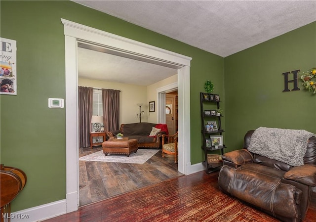 815 N Walnut St, Dover, OH 44622 - living area with wood finished floors and baseboards