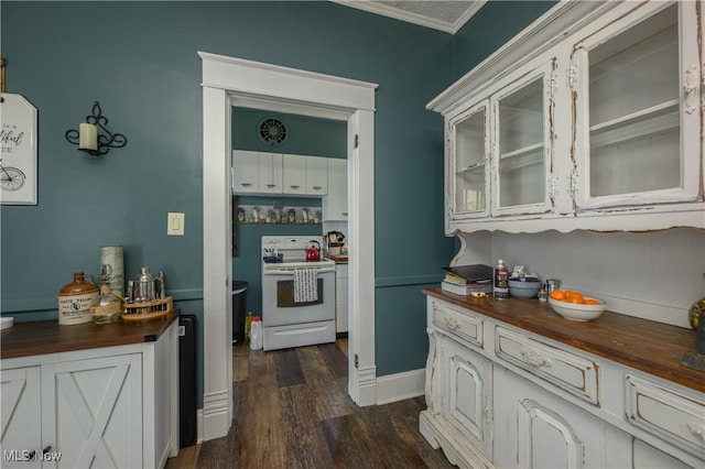 815 N Walnut St, Dover, OH 44622 - kitchen with butcher block countertops, white electric stove, dark wood-style flooring, glass insert cabinets, and ornamental molding