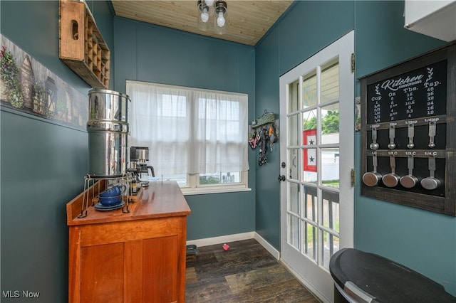 815 N Walnut St, Dover, OH 44622 - entryway featuring dark wood-style flooring and wood ceiling