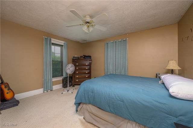 815 N Walnut St, Dover, OH 44622 - carpeted bedroom featuring ceiling fan and a textured ceiling