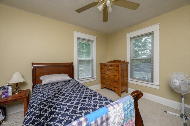 815 N Walnut St, Dover, OH 44622 - carpeted bedroom featuring baseboards and ceiling fan