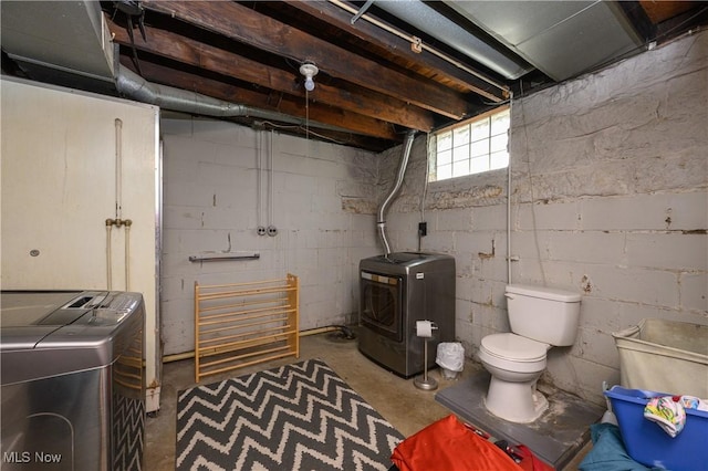 815 N Walnut St, Dover, OH 44622 - below grade area with washer and clothes dryer