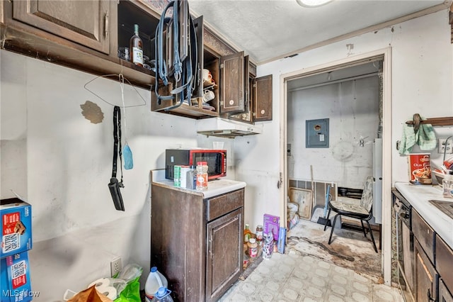 552 Turney Rd Unit A, Bedford, OH 44146 - kitchen featuring light countertops, dark brown cabinets, and light flooring
