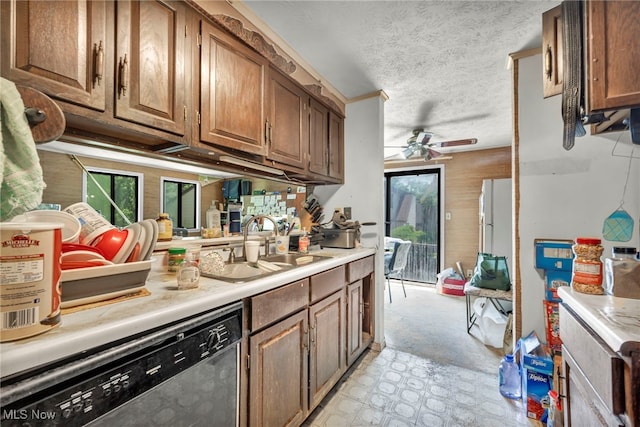 552 Turney Rd Unit A, Bedford, OH 44146 - kitchen featuring dishwasher, light countertops, a ceiling fan, a textured ceiling, and brown cabinets