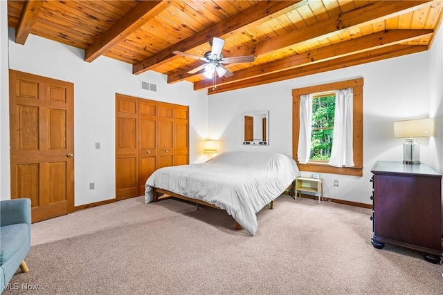 15961 Terramont St NE, Minerva, OH 44657 - bedroom featuring a wooden ceiling with exposed beams, carpet, a closet, and a ceiling fan
