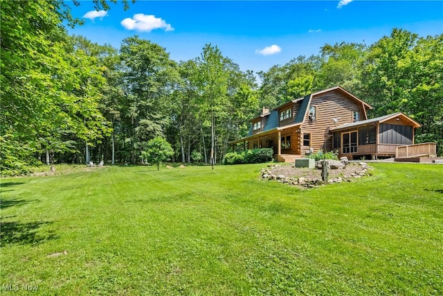 15961 Terramont St NE, Minerva, OH 44657 - view of grassy yard with a sunroom