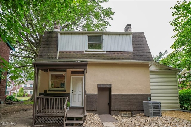 1967 Tonawanda Ave, Akron, OH 44305 - rear view of property featuring a chimney, a shingled roof, and stucco siding