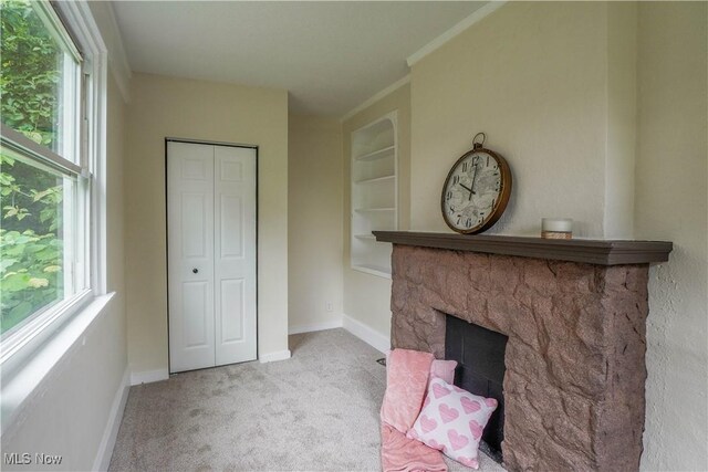1967 Tonawanda Ave, Akron, OH 44305 - carpeted living area with baseboards and a stone fireplace