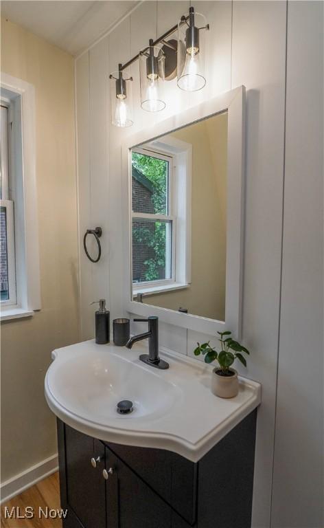 1967 Tonawanda Ave, Akron, OH 44305 - bathroom with vanity and wood finished floors