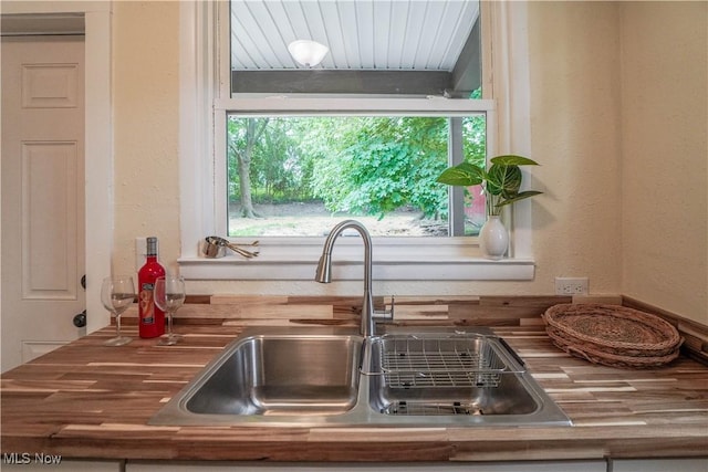 1967 Tonawanda Ave, Akron, OH 44305 - kitchen with a sink and wooden counters