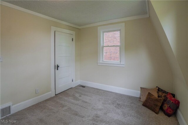1967 Tonawanda Ave, Akron, OH 44305 - empty room featuring carpet flooring, ornamental molding, and a textured ceiling