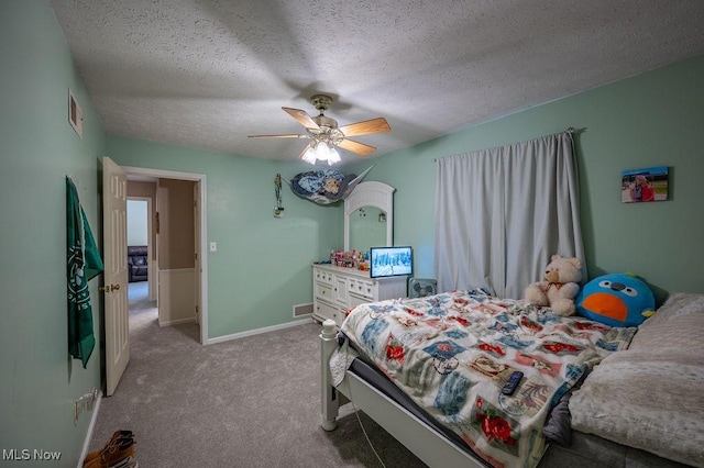 106 Wedgewood Dr, Parkersburg, WV 26104 - carpeted bedroom featuring a ceiling fan and a textured ceiling