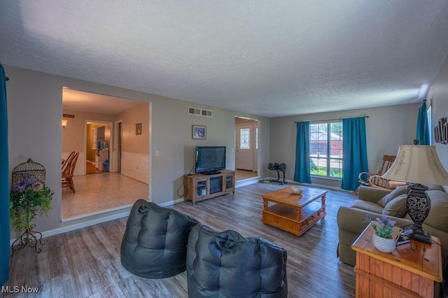 106 Wedgewood Dr, Parkersburg, WV 26104 - living room with a textured ceiling and wood finished floors