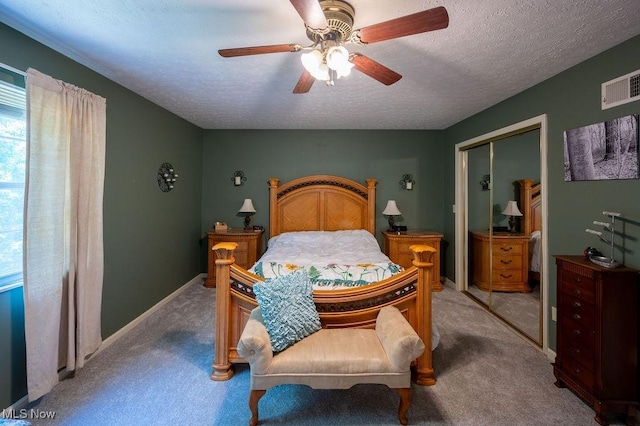 106 Wedgewood Dr, Parkersburg, WV 26104 - bedroom with carpet, a closet, ceiling fan, and a textured ceiling