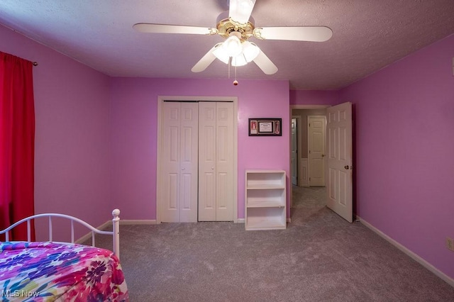 106 Wedgewood Dr, Parkersburg, WV 26104 - bedroom featuring carpet floors, a closet, a ceiling fan, and a textured ceiling