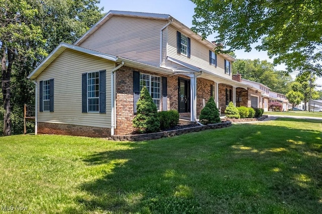 106 Wedgewood Dr, Parkersburg, WV 26104 - traditional-style house featuring a garage and a front yard