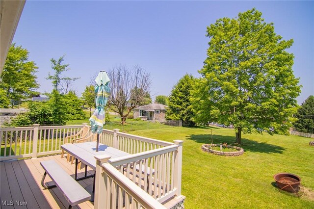 104 W Blvd, Mingo Junction, OH 43938 - deck with outdoor dining area and a lawn