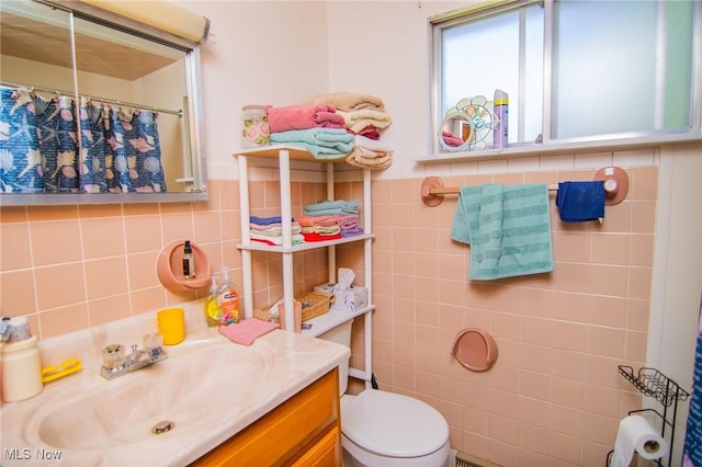 104 W Blvd, Mingo Junction, OH 43938 - bathroom featuring tile walls, vanity, and a shower with curtain