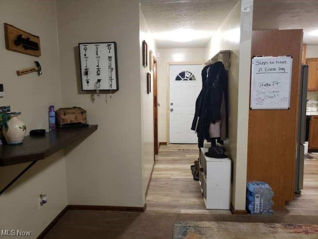 812 W W, Elyria, OH 44035 - hall with baseboards and light wood-style flooring
