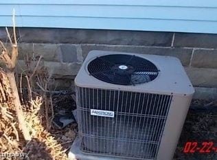 812 W W, Elyria, OH 44035 - exterior view of a central air condition unit