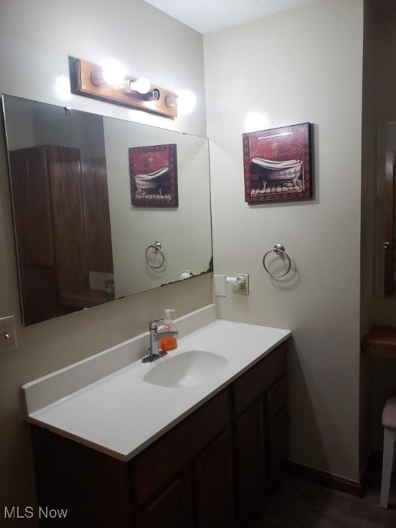 812 W W, Elyria, OH 44035 - bathroom with vanity and baseboards
