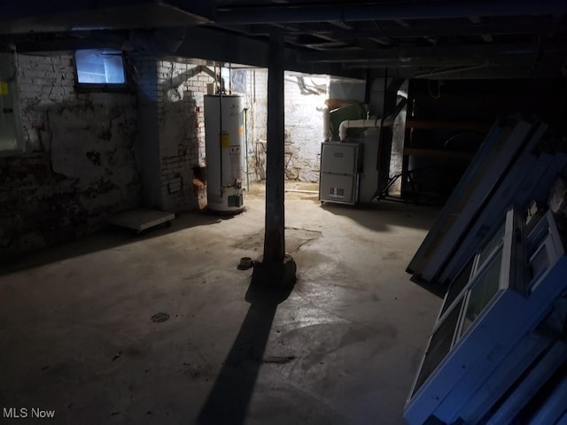 812 W W, Elyria, OH 44035 - below grade area featuring water heater and heating unit