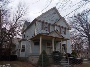 812 W W, Elyria, OH 44035 - victorian home with covered porch and a fenced front yard