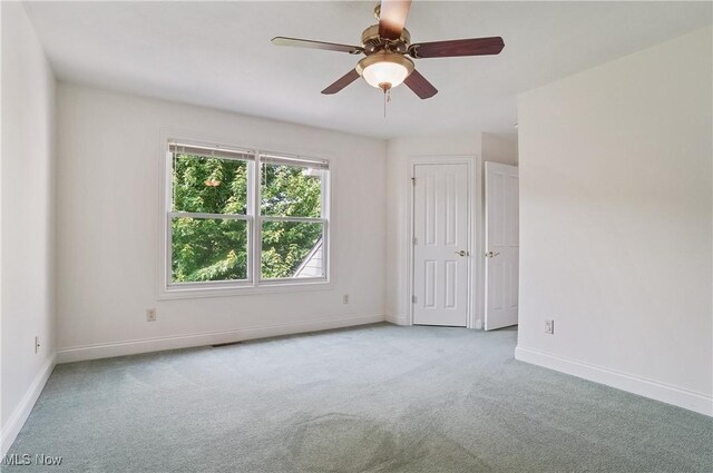 1288 Windward Ln, Kent, OH 44240 - carpeted empty room featuring baseboards and a ceiling fan