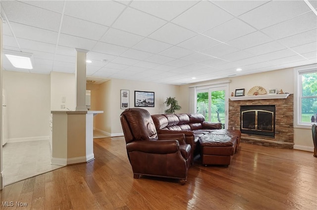1288 Windward Ln, Kent, OH 44240 - living area featuring hardwood / wood-style flooring, a fireplace, a drop ceiling, and recessed lighting
