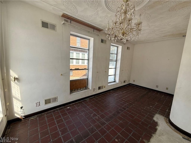 522 N 3rd St, Toronto, OH 43964 - empty room with baseboards and a chandelier