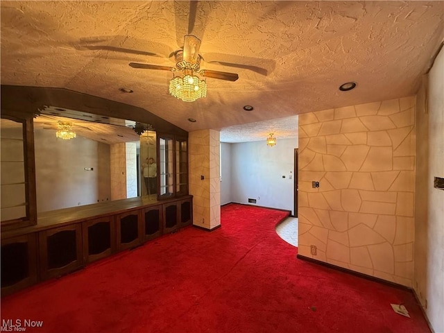 522 N 3rd St, Toronto, OH 43964 - unfurnished room with ceiling fan, carpet floors, lofted ceiling, and a textured ceiling