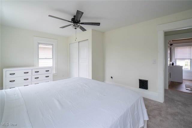 326 N Park Ave, Alliance, OH 44601 - carpeted bedroom with a closet and a ceiling fan