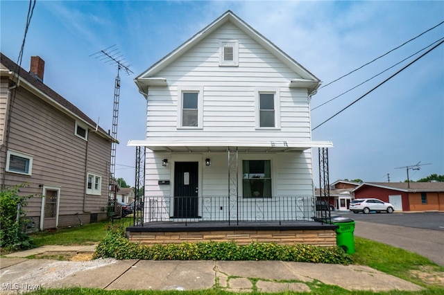 326 N Park Ave, Alliance, OH 44601 - american foursquare style home featuring a porch
