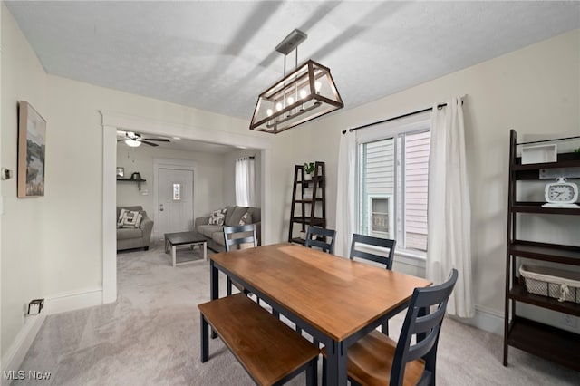 326 N Park Ave, Alliance, OH 44601 - dining room featuring light colored carpet and a ceiling fan
