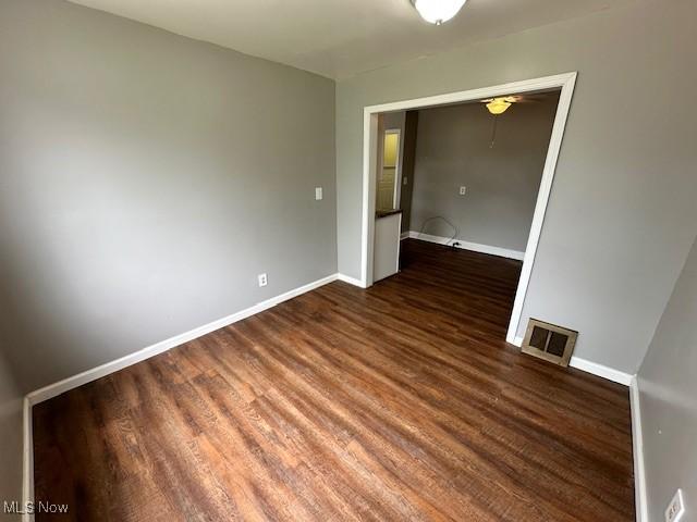 21316 Watson Rd, Maple Heights, OH 44137 - spare room with wood finished floors and baseboards