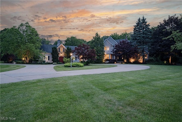 7488 Valley View Rd, Hudson, OH 44236 - view of front of house with curved driveway and a yard