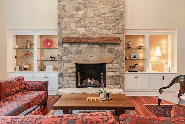 7488 Valley View Rd, Hudson, OH 44236 - living area with wood finished floors, built in features, and a fireplace
