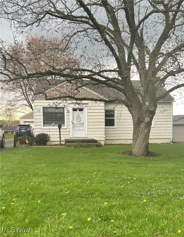 7438 Westview Dr, Youngstown, OH 44512 - view of front of property with a front yard