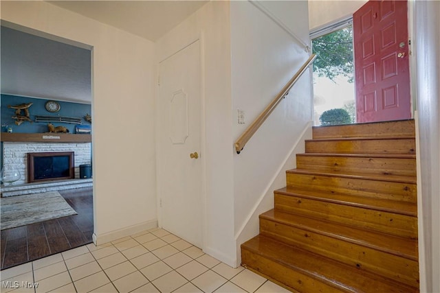 1701 19th Ave, Parkersburg, WV 26101 - stairs with a fireplace and tile patterned floors